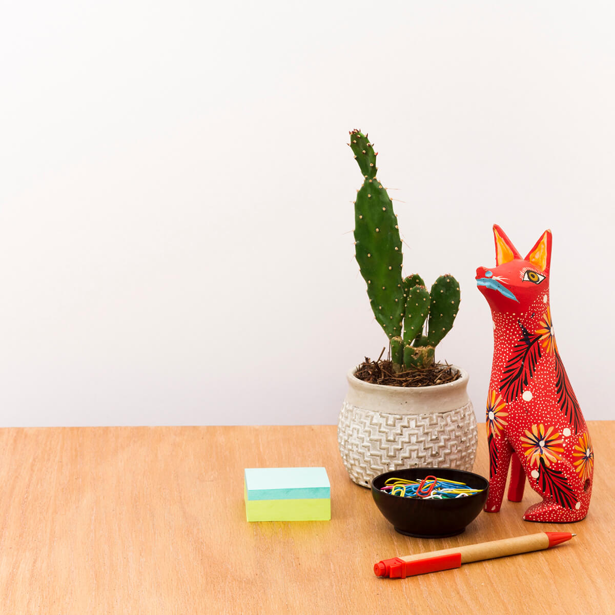 contemporary workplace with cactus pot statue